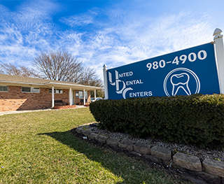 Sign outside of United Dental Centers of Merrillville dental office building