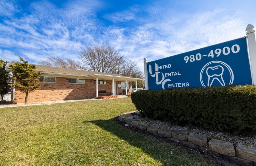 Sign outside of United Dental Centers of Merrillville dental office building