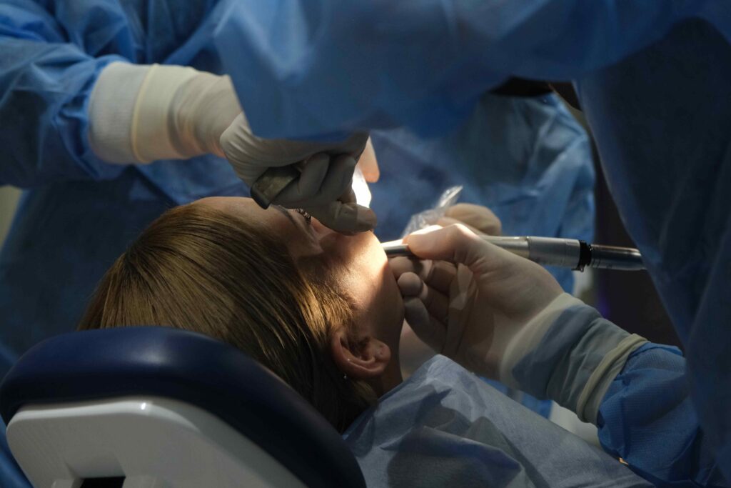 Woman getting oral surgery